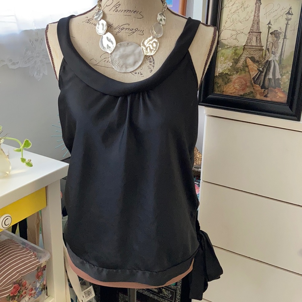 Old Navy cute silky feel top with bottom side tie.